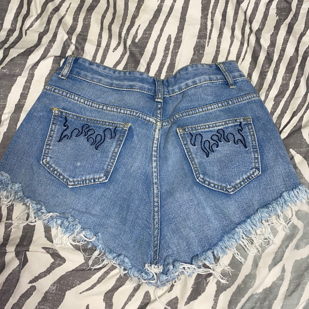 High waisted shorts with flames on back pocket